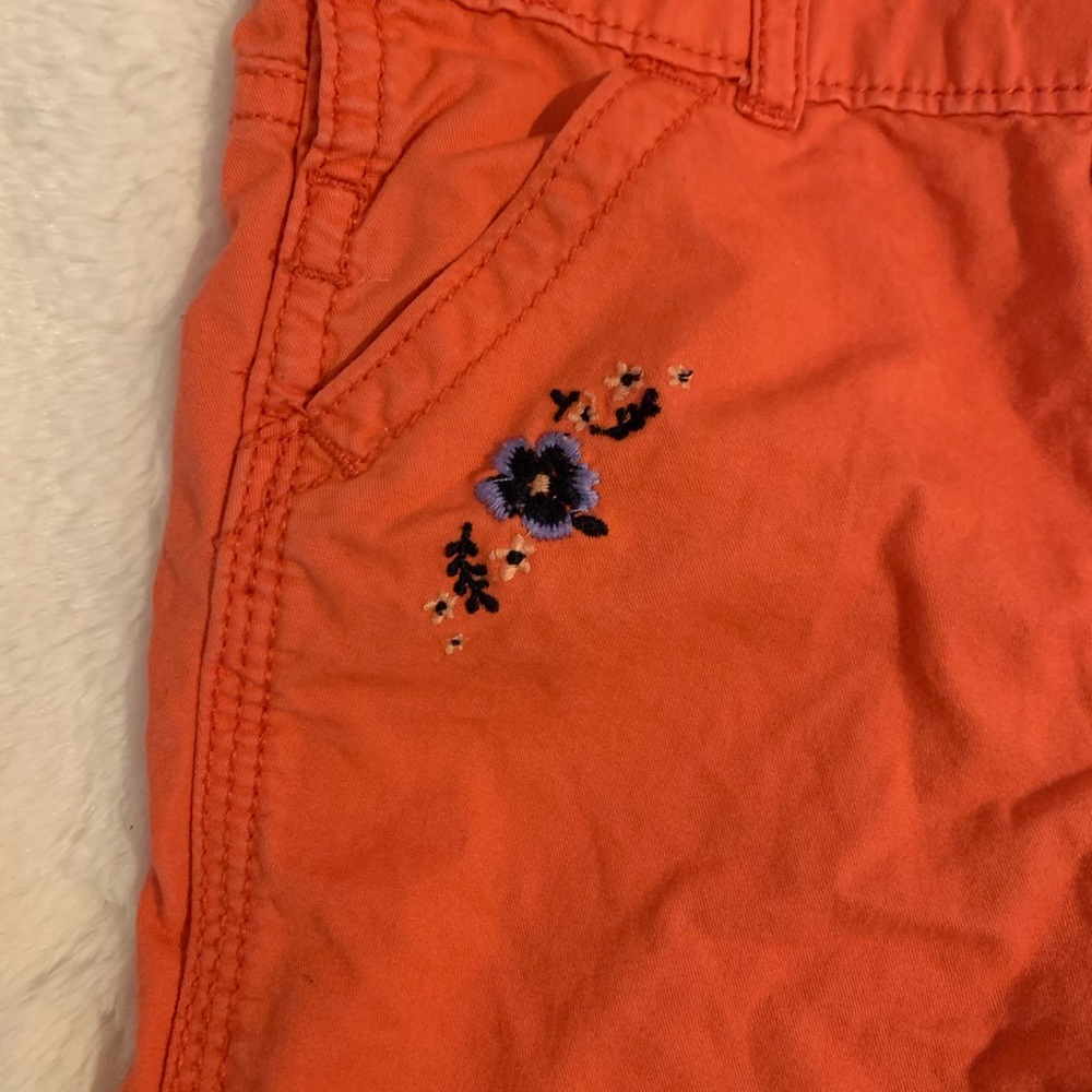 Cute Orange Overalls With A Floral Print